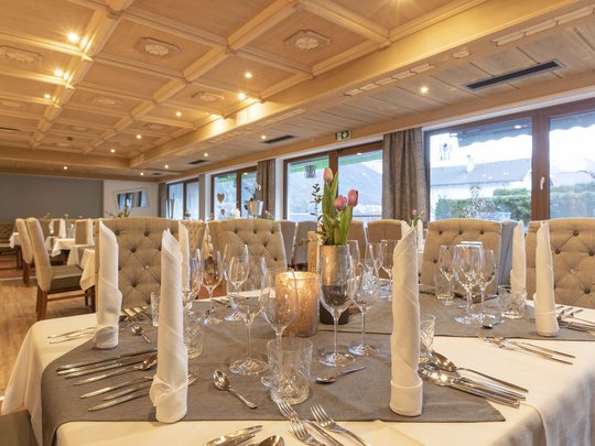 Romance in the mountains Elegant restaurant interior with set tables and floral centerpieces