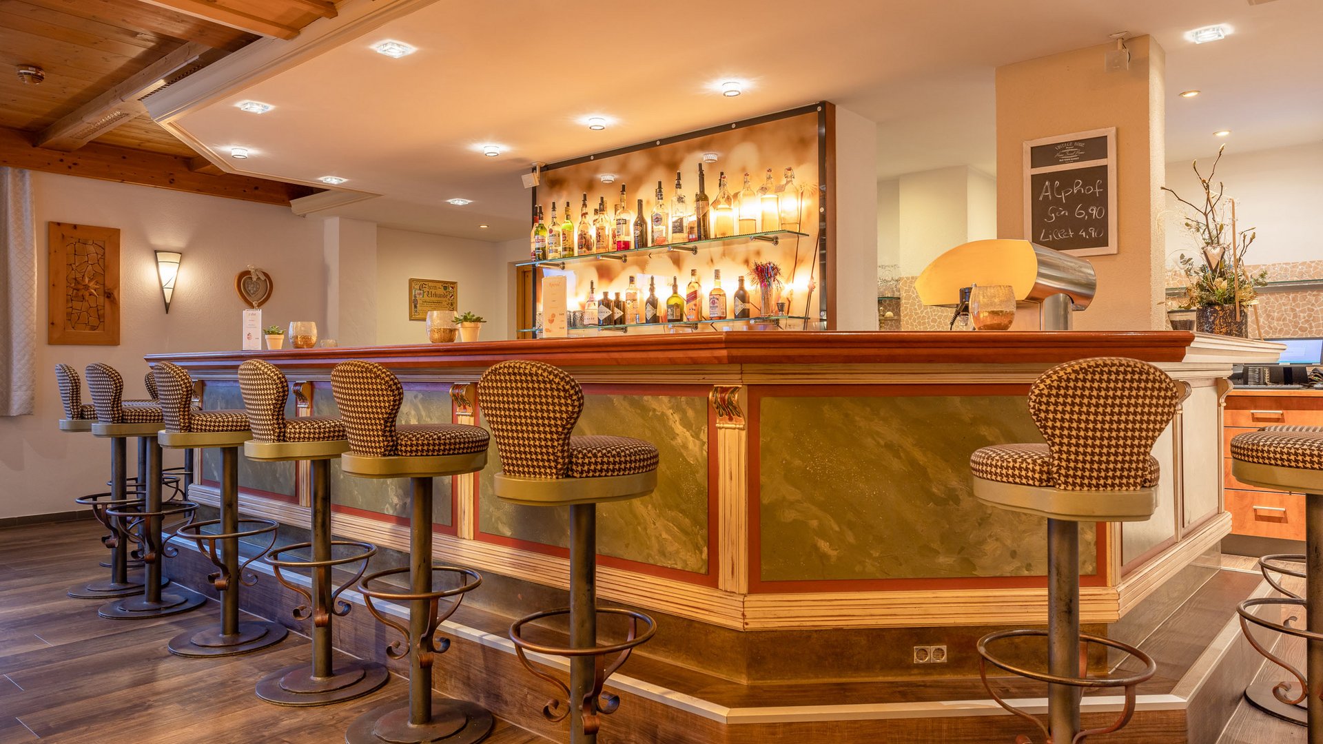 Romance in the mountains Cozy bar with wooden counter and upholstered bar stools